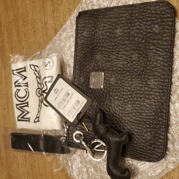 Wristlet Luxury Designer By Mcm, Size: Small main image 1